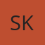 S K