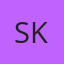 S K