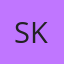 S K