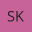 S K