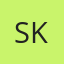 S K