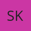 S K