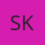 S K