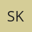 S K
