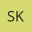 S K