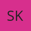 S K