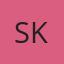 S K