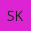 S K