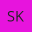 S K