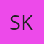 S K