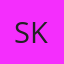 S K