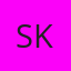 S K