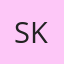 S K