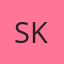 S K